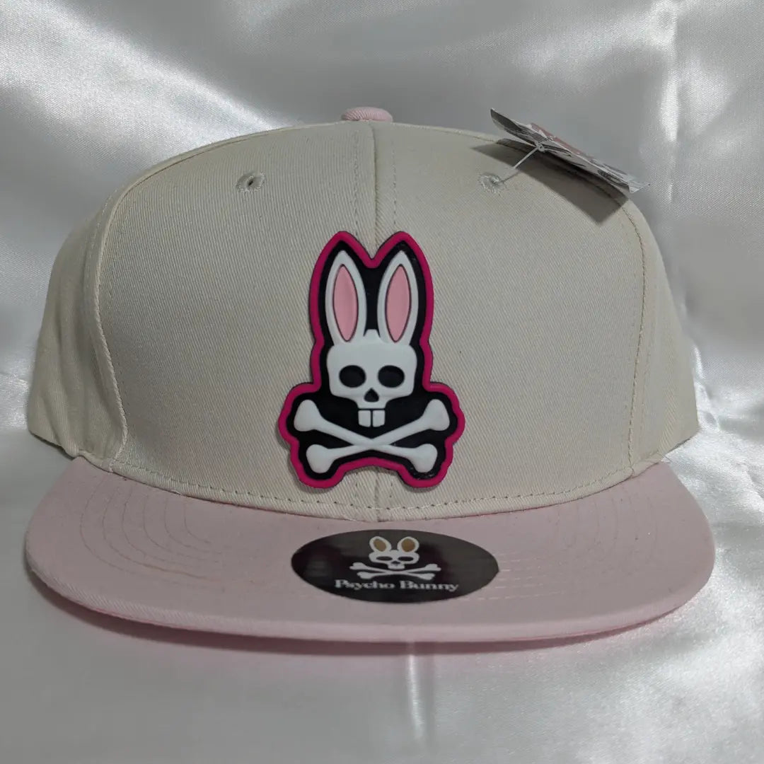 Gorra visera plana diseño Psycho Bunny bicolor