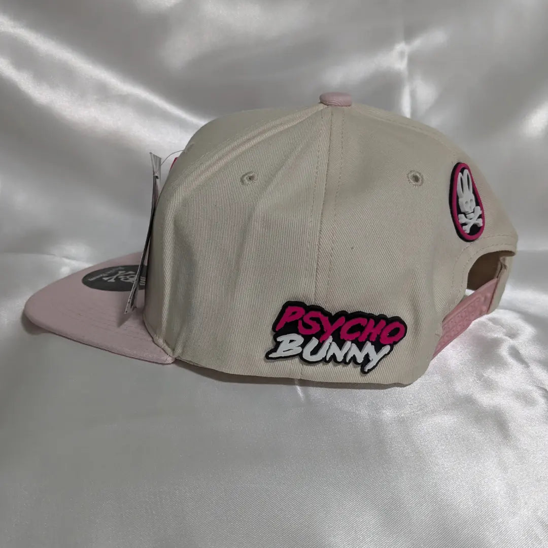 Gorra visera plana diseño Psycho Bunny bicolor