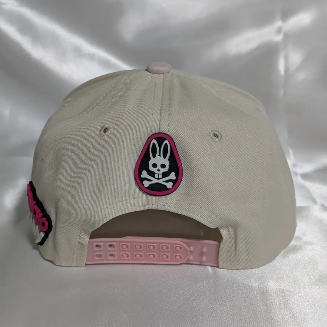 Gorra visera plana diseño Psycho Bunny bicolor