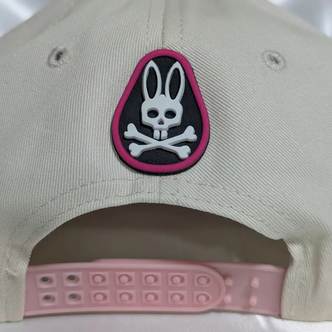 Gorra visera plana diseño Psycho Bunny bicolor